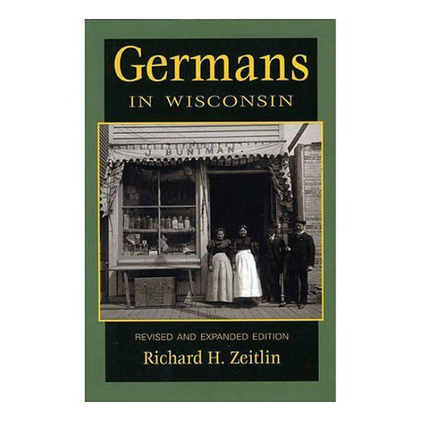 Germans in Wisconsin book cover featuring black and white image of German people standing outside of shop