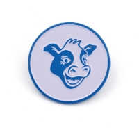 Round shaped pin with a white background and blue outline.  Inside is a illustrated blue outline of a cow head with his mouth ajar in a smile.