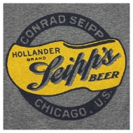 Zoomed in image of the frontside of a grey crewcut t-shirt showing the Seipp's Beer logo. A black ribbon in a circle says "Conrad Seipp, Chicago, U.S." and inside the circle is a yellow clog with the cursive text "Seipp's Beer, Hollander Brand"