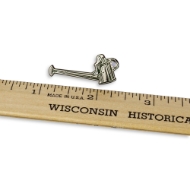 Lapel pin next to a ruler showing about 1.5 inches long.