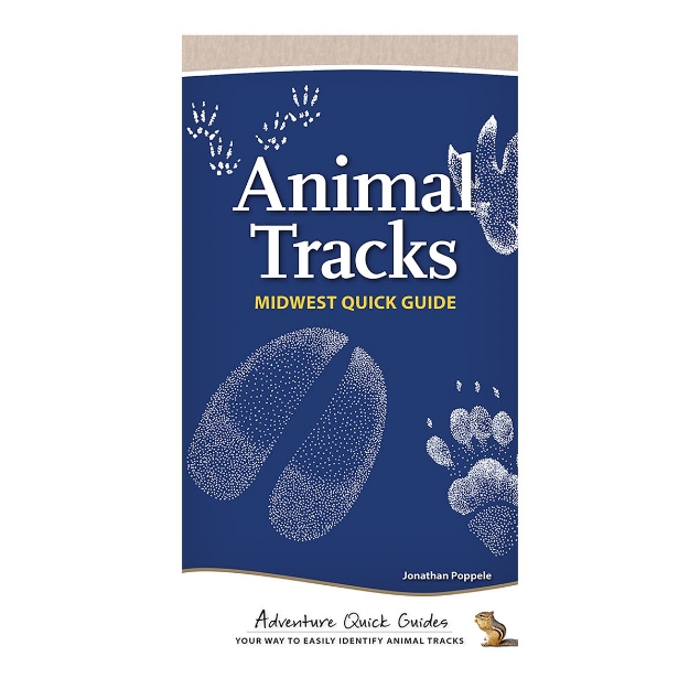 Animal Tracks book cover featuring dark blue background with white animal tracks across the page. 