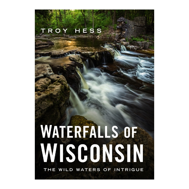 Book cover of "Waterfalls of Wisconsin" showing a color photograph of one of the state's waterfalls in a wooded setting. 