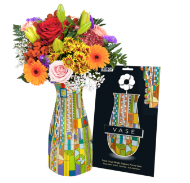 Multicolor, collapsible plastic fase with Frank Lloy Wright's "Saguaro Forms" design. Shown with flowers inserted in vase. next to black packaging.