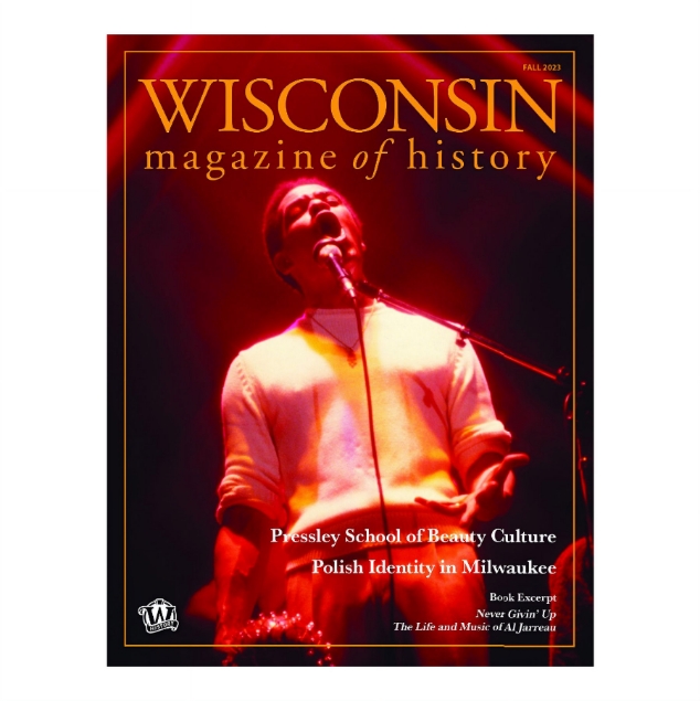 Cover of Wisconsin Magazine of History Fall 2023 with concert photo of singer Al Jarreau signing under red lighting.