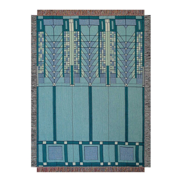 Throw blanket with geometric Frank Lloyd Wright "Tree of Life" design in light blue. 