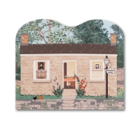 Miniature wood cutout with print of Pendarvis House, a historic site in Mineral Point, WI.